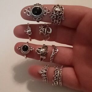 #875.  10 Piece Assorted Size & Style Silver Toned & Black Cabochon Ring Bundle